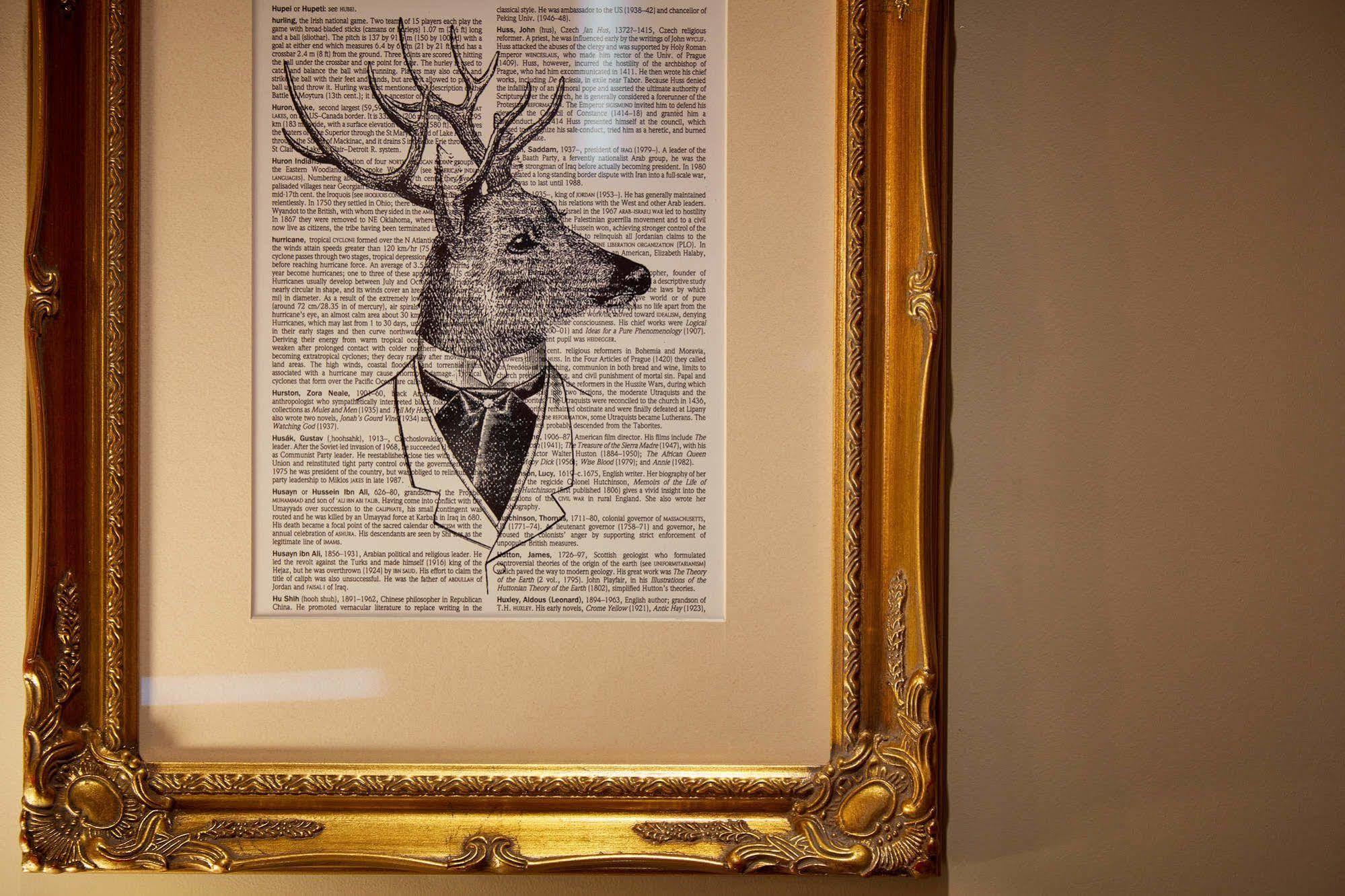 Oddfellows On The Park Cheadle  Kültér fotó A framed print of a deer head with a bow tie